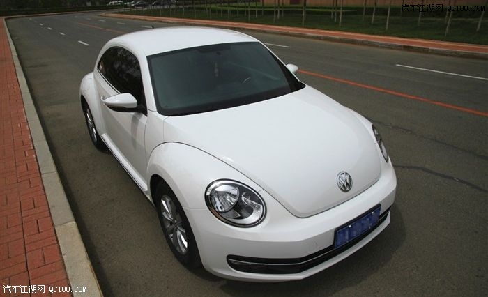 白色甲壳虫提车了,动力不错,挺省油,总体感觉还好!